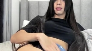 lengthy darksome Hair Transgirl Tugs Her enormous jock On web camera